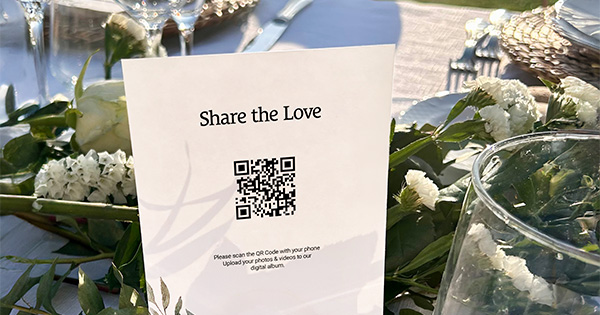 QR Code card on a wedding reception table